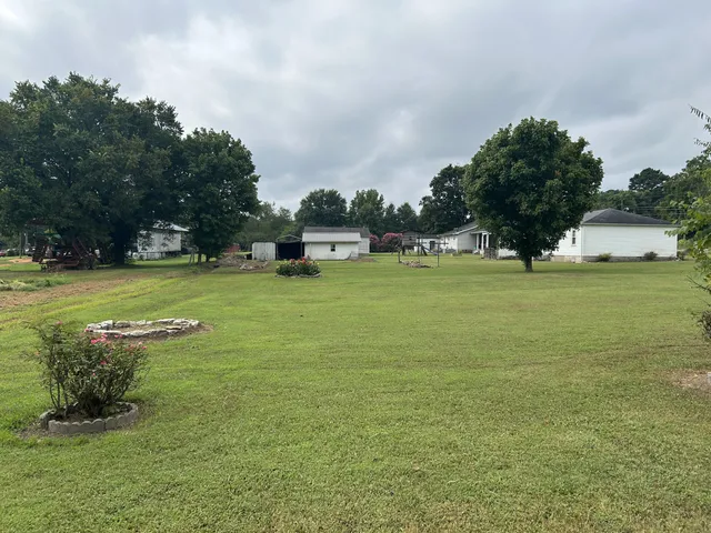 a view of a lake view with a big yard