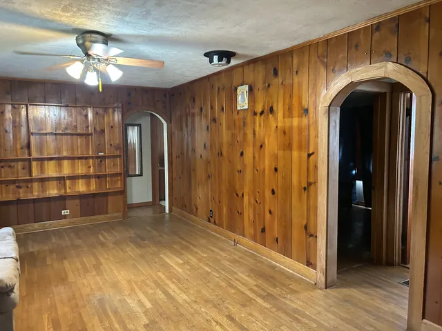 a view of entryway with wooden floor