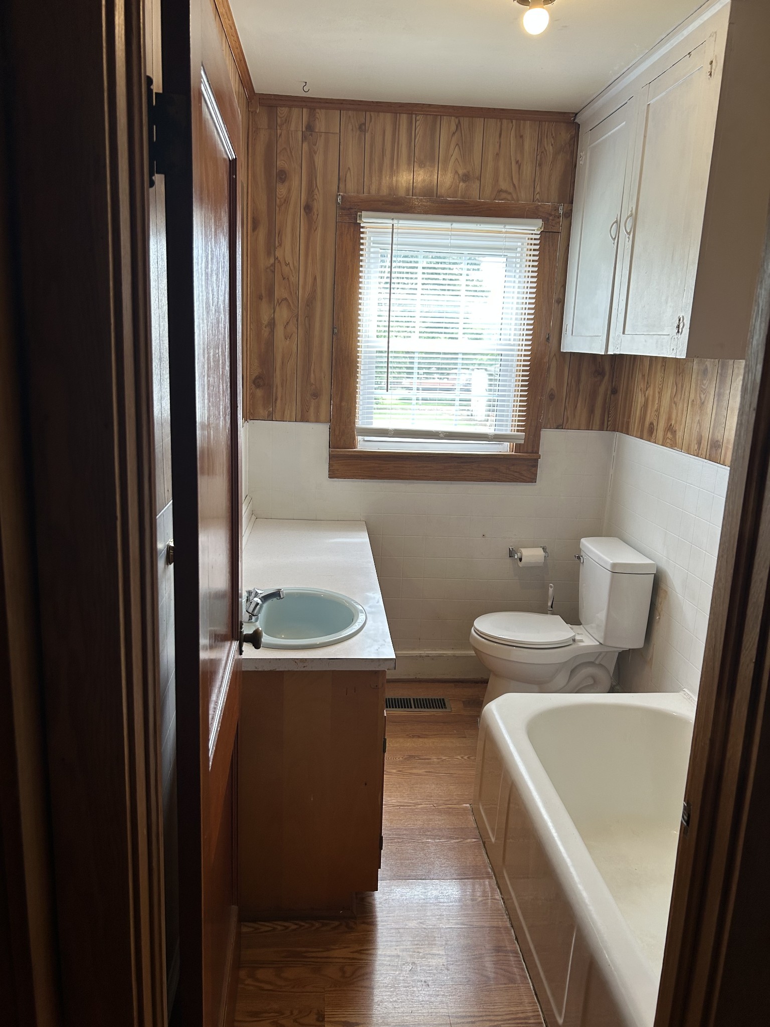 150 Chestnut Street Iron City, TN 38463 - Photo 21 of 29 a bathroom with a sink a toilet and tub