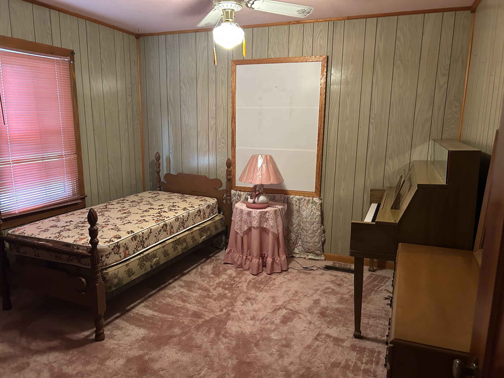 150 Chestnut Street Iron City, TN 38463 - Photo 29 of 29 a bedroom with a bed and a window