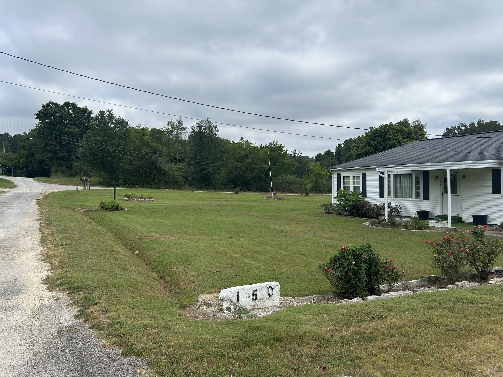 150 Chestnut Street Iron City, TN 38463 - Photo 7 of 29 a view of a house with a yard