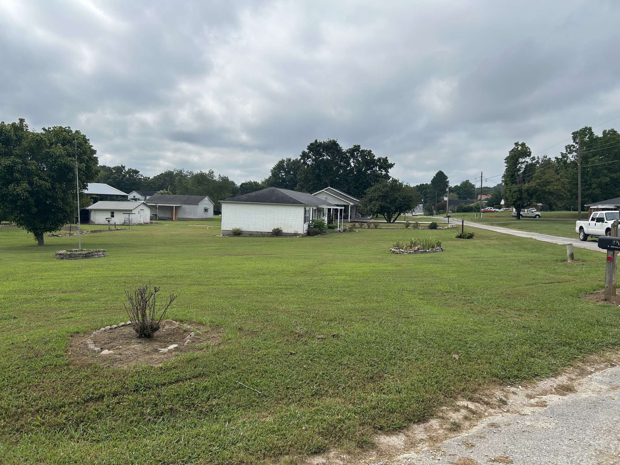 150 Chestnut Street Iron City, TN 38463 - Photo 9 of 29 a view of a golf course with a lake