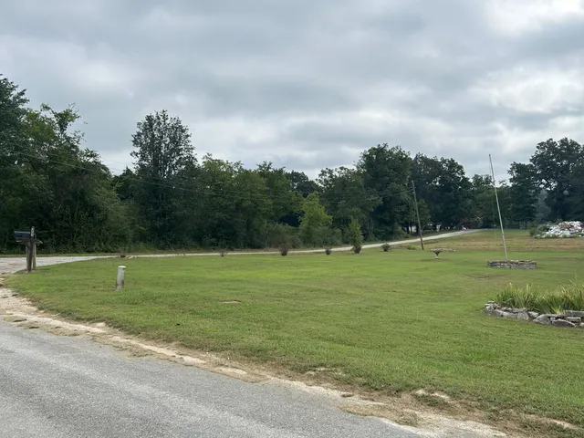 a view of a golf course with a lake