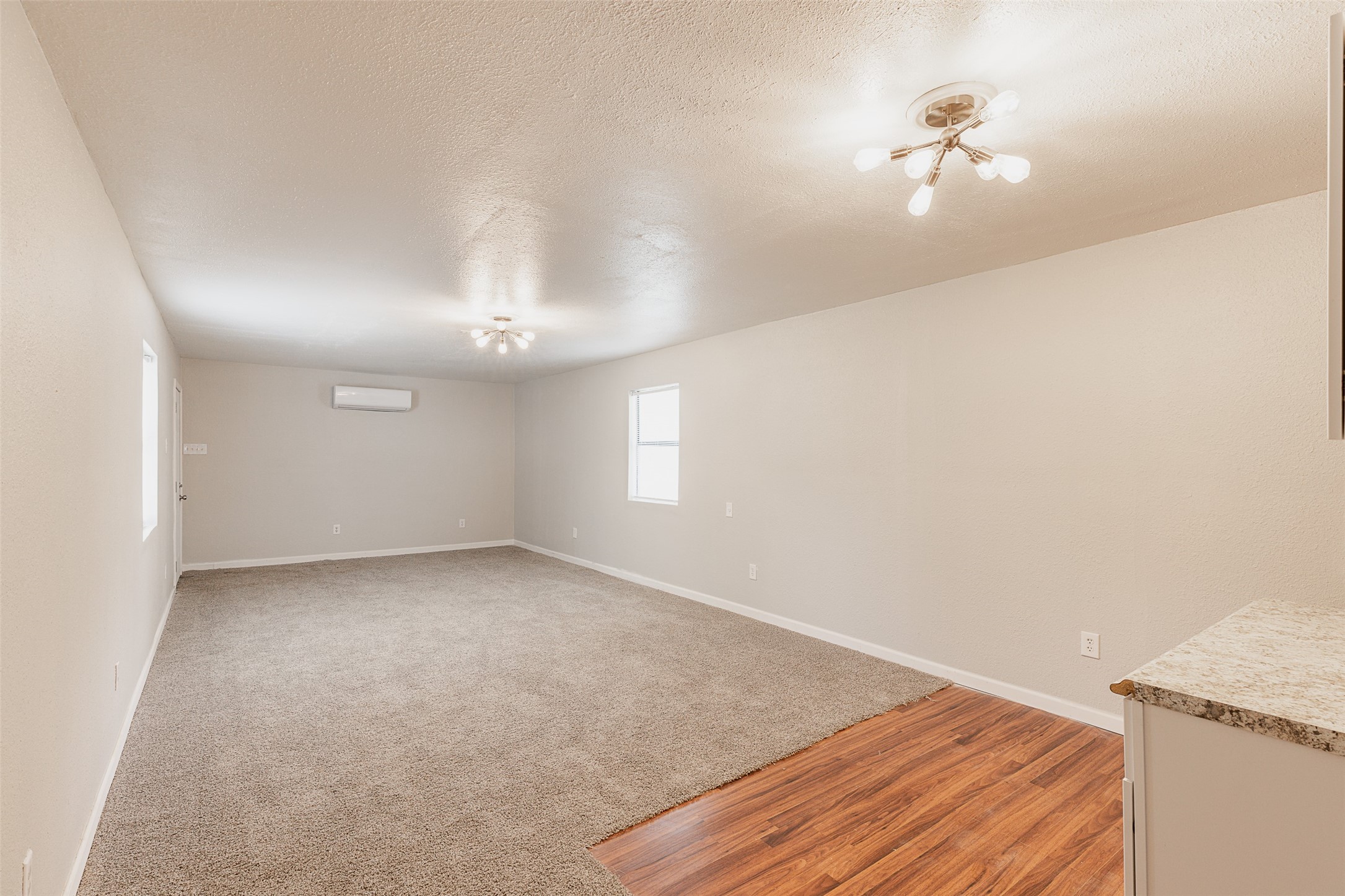 1520 West Creek Drive Conroe, TX 77304 - Photo 19 of 29 a view of empty room with windows