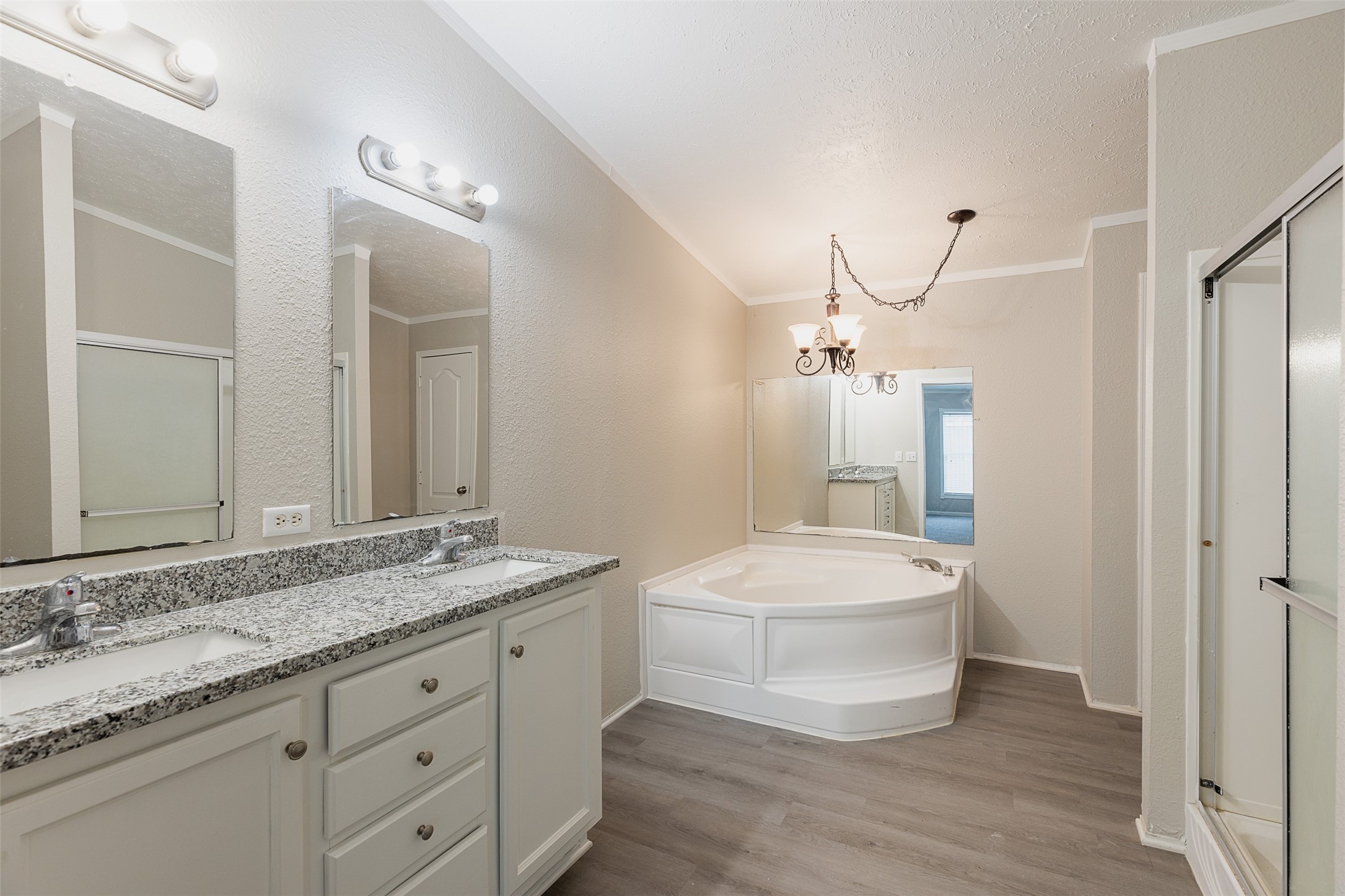 1520 West Creek Drive Conroe, TX 77304 - Photo 24 of 29 a bathroom with a granite countertop double vanity sink mirror and toilet