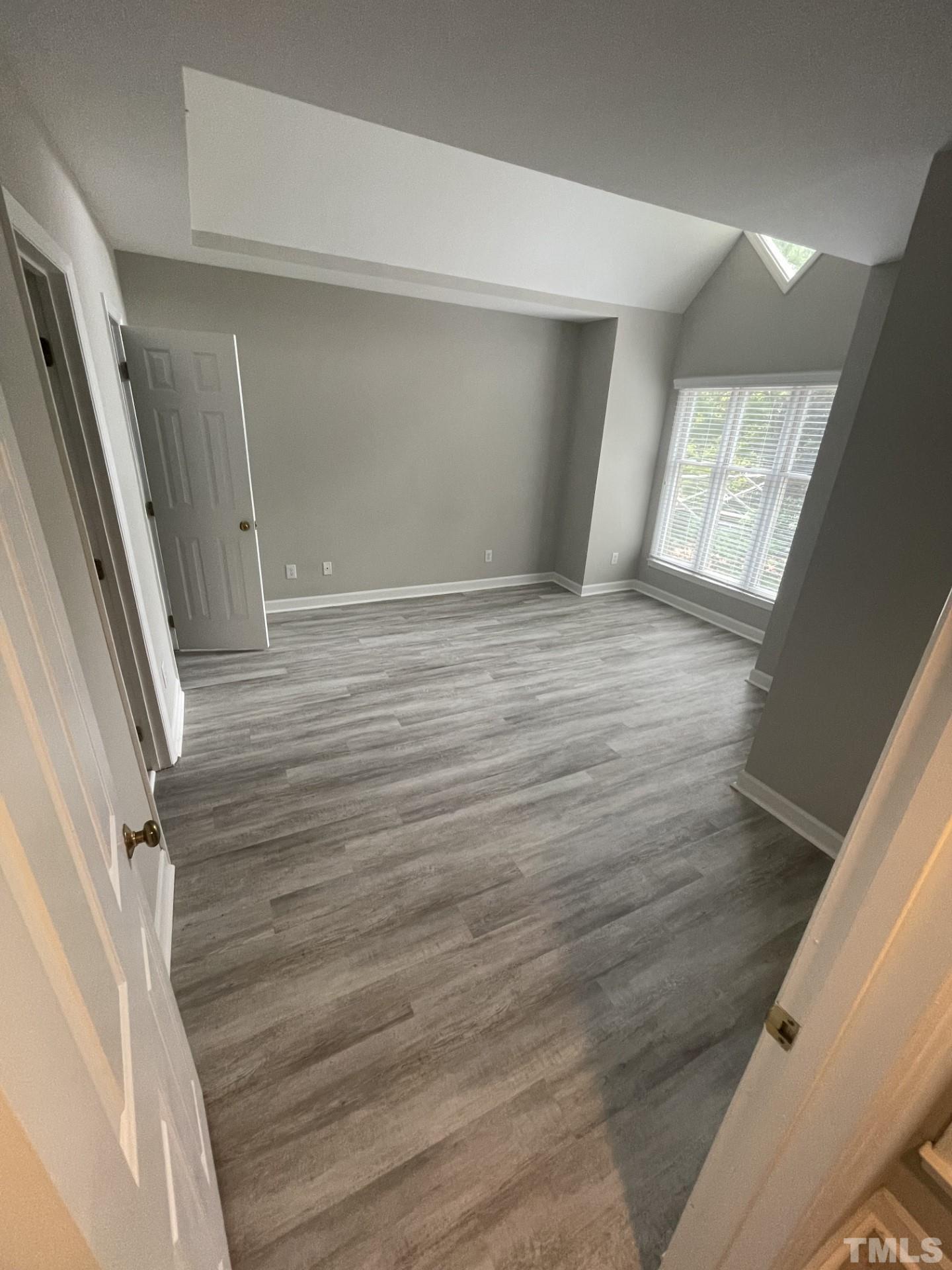243 New Bern Place, Unit 301 Raleigh, NC 27601 - Photo 13 of 19 a view of an empty walk in closet