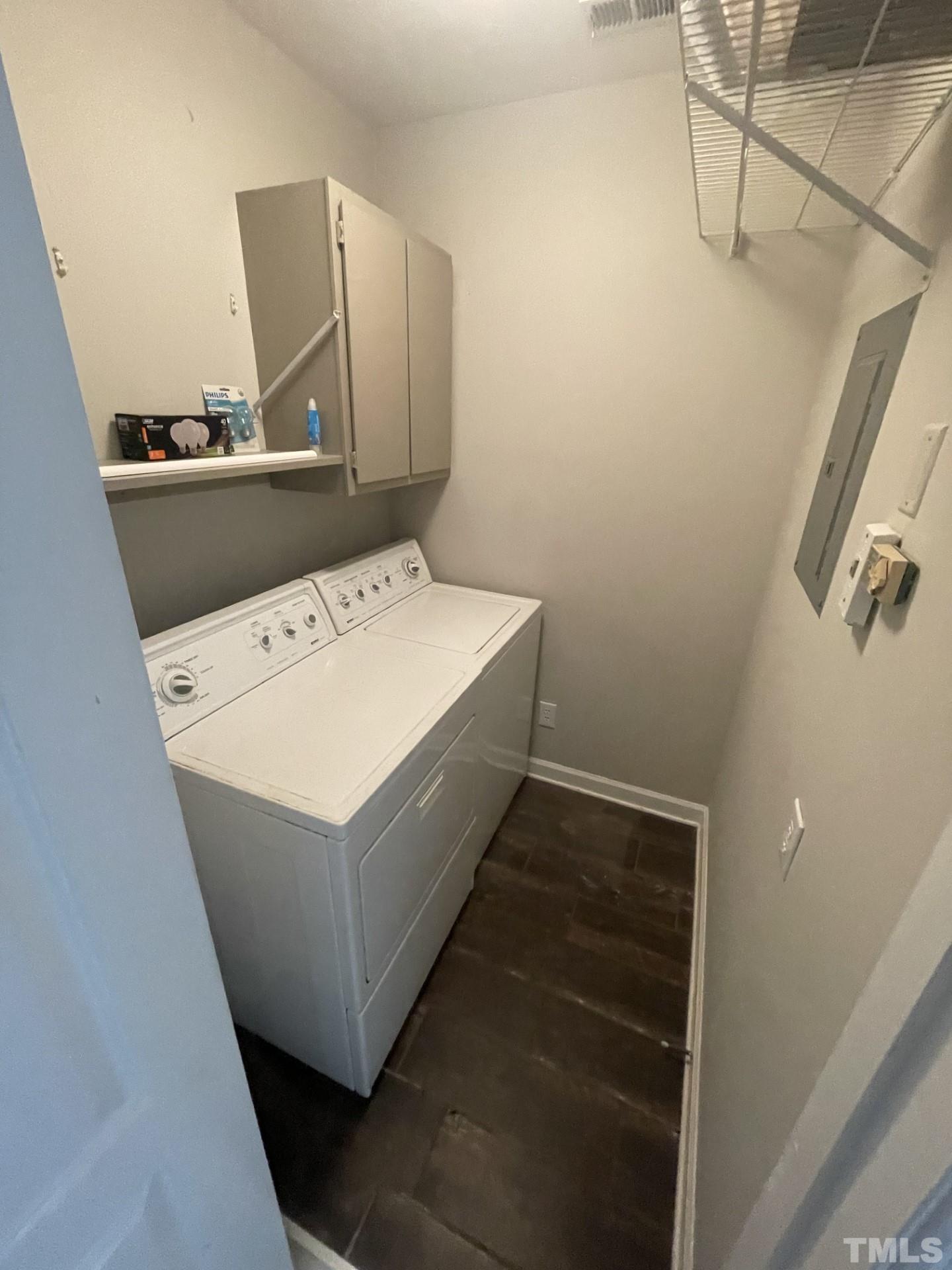 243 New Bern Place, Unit 301 Raleigh, NC 27601 - Photo 14 of 19 a utility room with washer and dryer