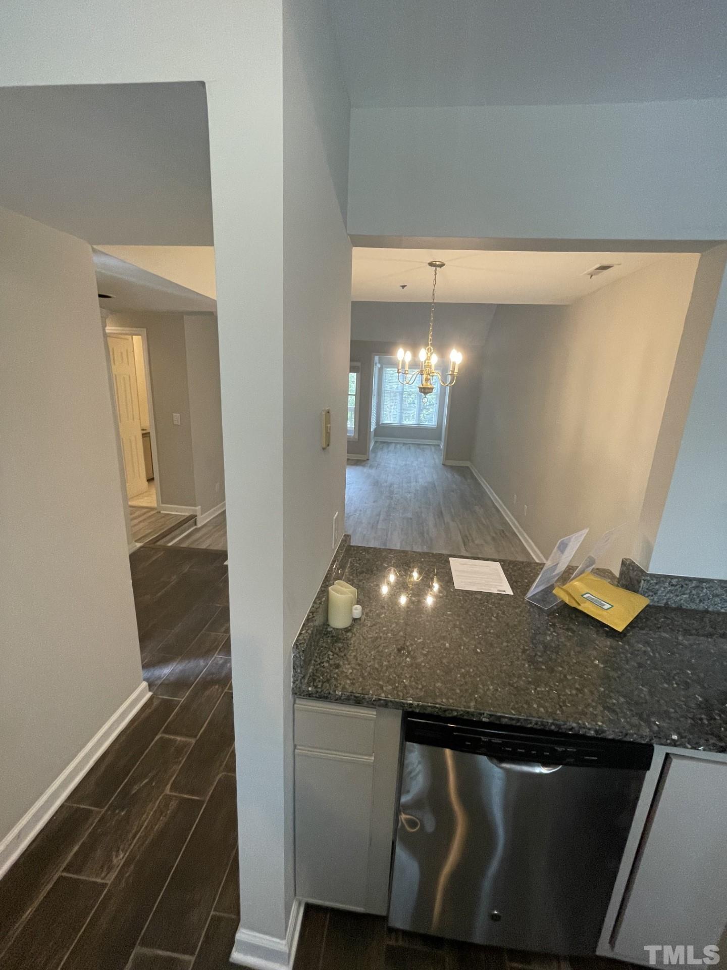 243 New Bern Place, Unit 301 Raleigh, NC 27601 - Photo 8 of 19 a view of entryway and hall