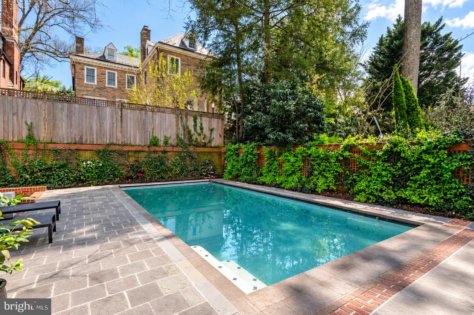 2468 Belmont Road Northwest Washington, DC 20008 - Photo 44 of 49 Backyard with in ground heated saltwater pool