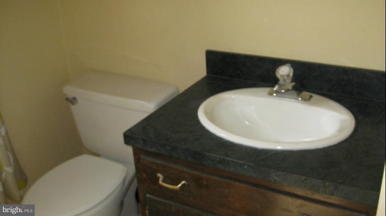 13105 Bottom Road Hydes, MD 21082 - Photo 15 of 22 a bathroom with a toilet