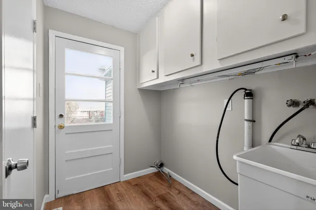 a room with cabinets and a window