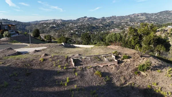 a view of a backyard of a house