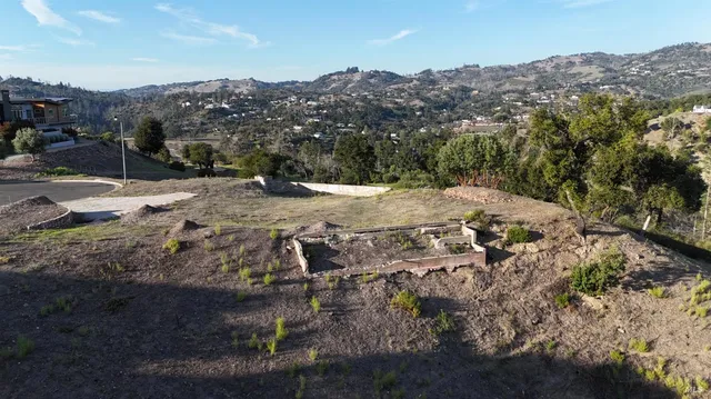 a view of a backyard of a house