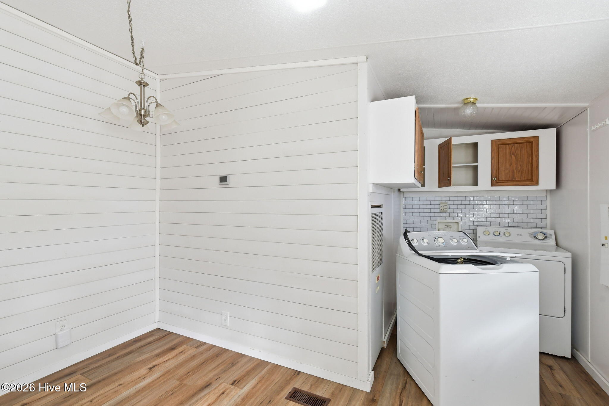 2228 Harbor Ridge Drive Southeast Bolivia, NC 28422 - Photo 11 of 30 Breakfast nook and lauandry room area