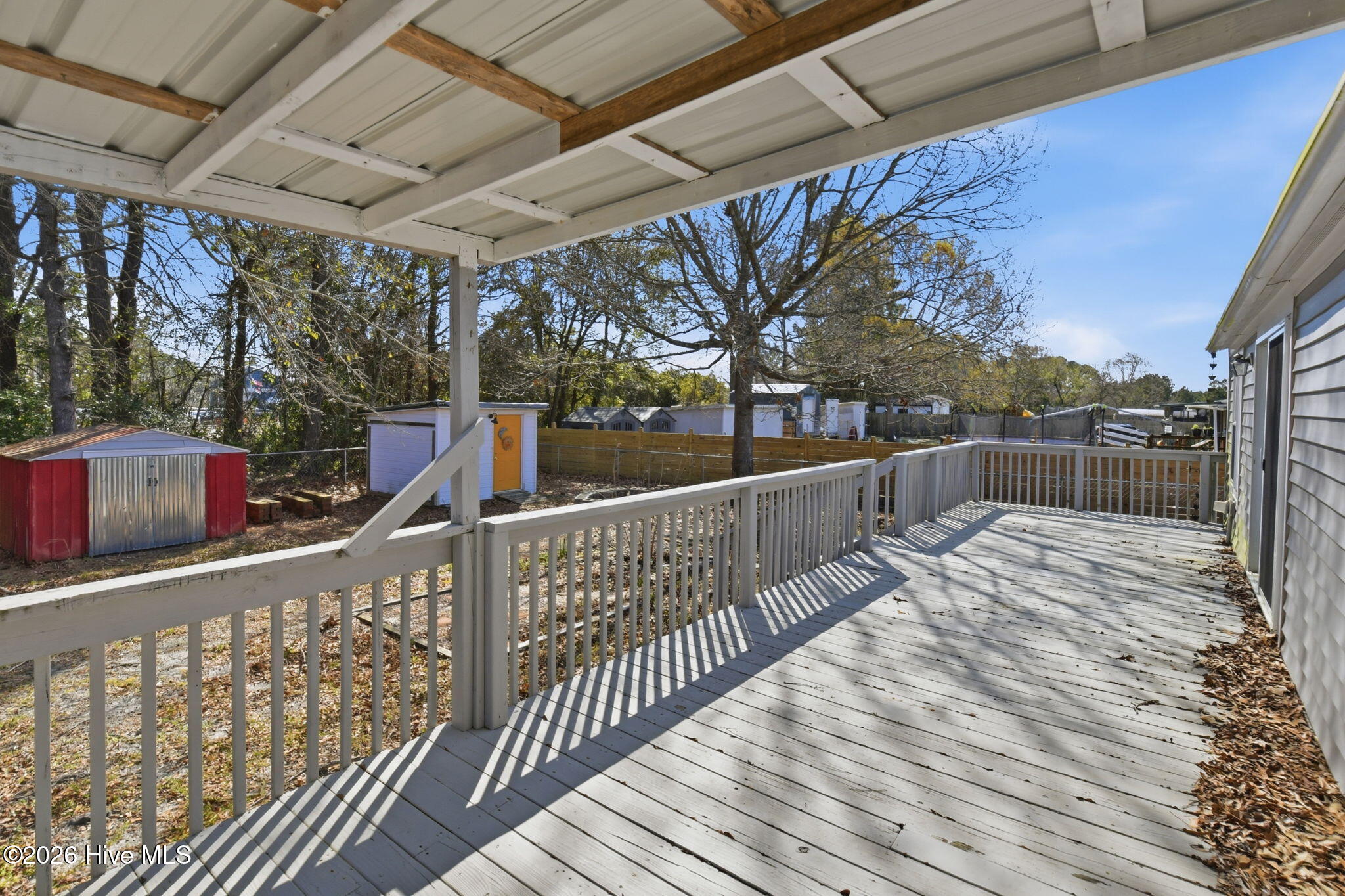 2228 Harbor Ridge Drive Southeast Bolivia, NC 28422 - Photo 13 of 30 Backyard Deck and storage Sheds