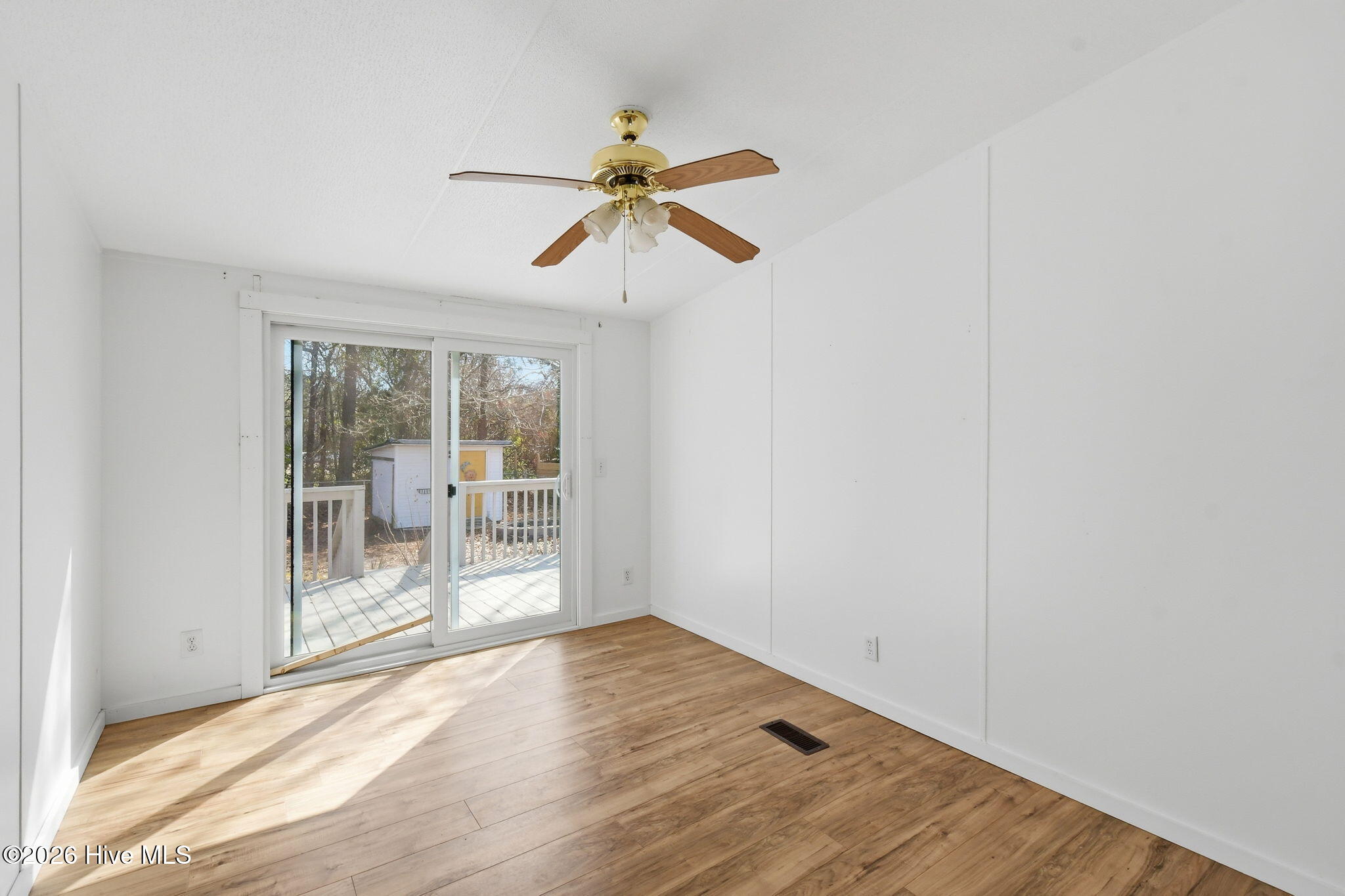 2228 Harbor Ridge Drive Southeast Bolivia, NC 28422 - Photo 17 of 30 Flex room doorway to Backyard Deck
