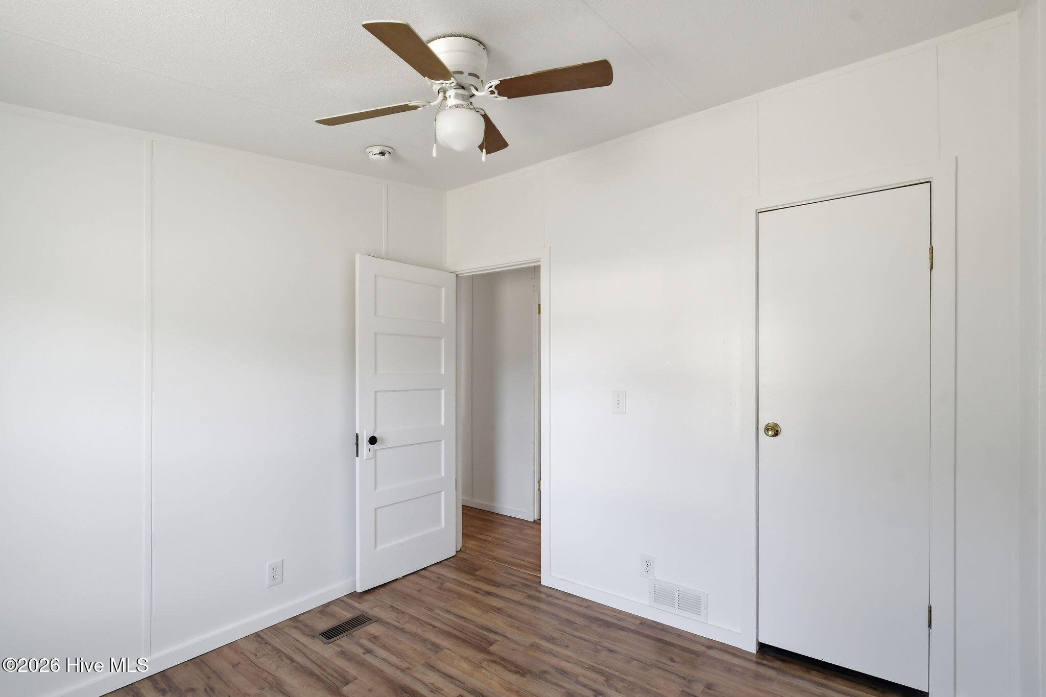 2228 Harbor Ridge Drive Southeast Bolivia, NC 28422 - Photo 20 of 30 Front Bedroom entrance to hall way