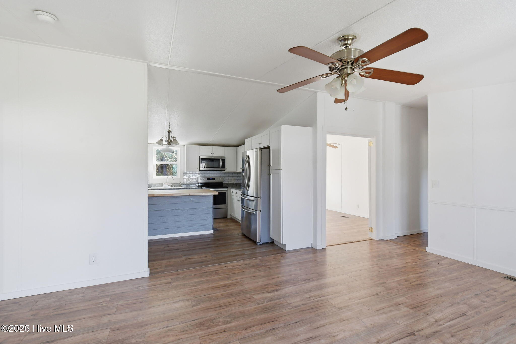 2228 Harbor Ridge Drive Southeast Bolivia, NC 28422 - Photo 2 of 30 Family Room looking into the Kitchen