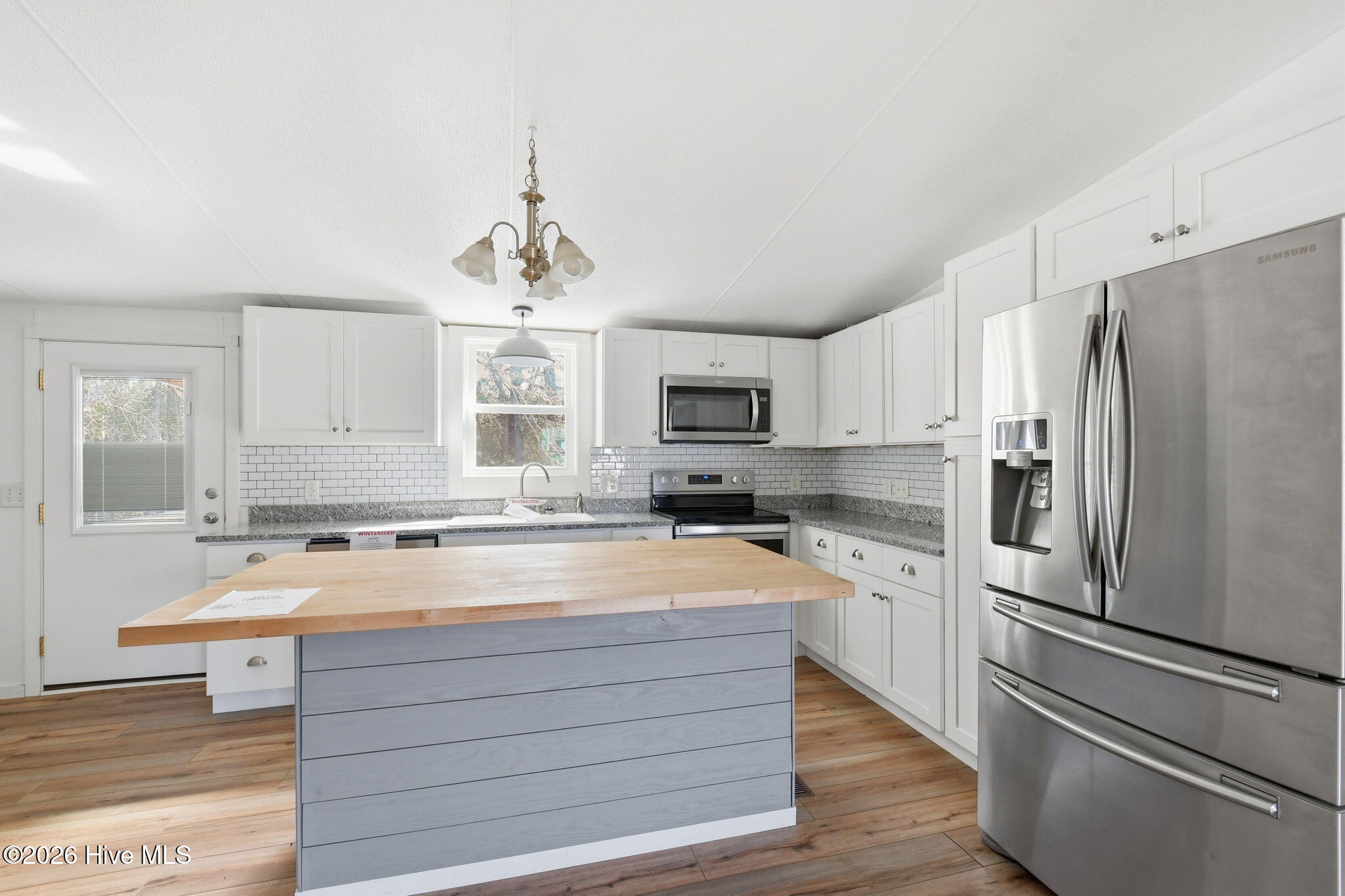 2228 Harbor Ridge Drive Southeast Bolivia, NC 28422 - Photo 9 of 30 Kitchen island and sink
