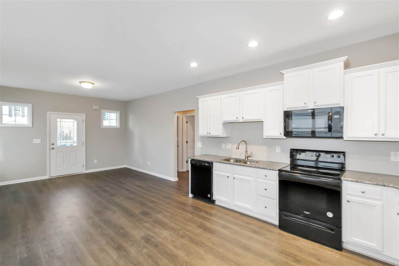 187 Yellow Jacket Ridge Clayton, NC 27520 - Photo 5 of 30 Kitchen/Family Room
