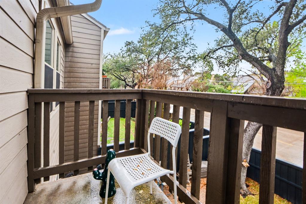 5616 Preston Oaks Road, Unit 102 Dallas, TX 75254 - Photo 11 of 11 a view of a balcony with furniture and a garden