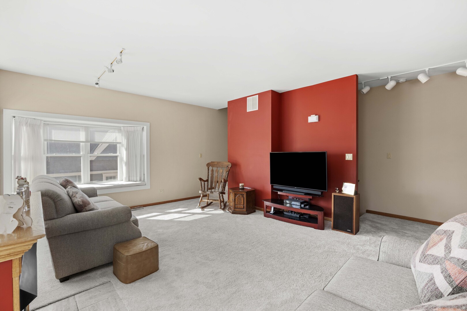 18134 Martin Avenue Homewood, IL 60430 - Photo 11 of 29 a living room with furniture and a flat screen tv