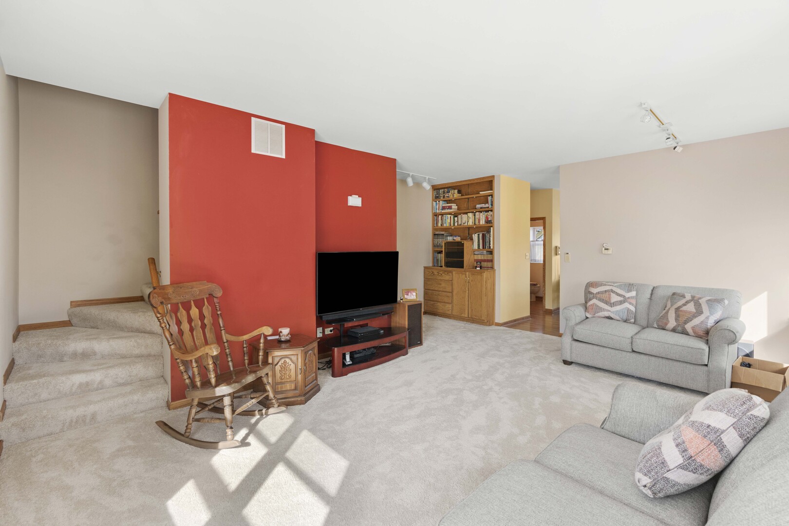 18134 Martin Avenue Homewood, IL 60430 - Photo 12 of 29 a living room with furniture and a flat screen tv