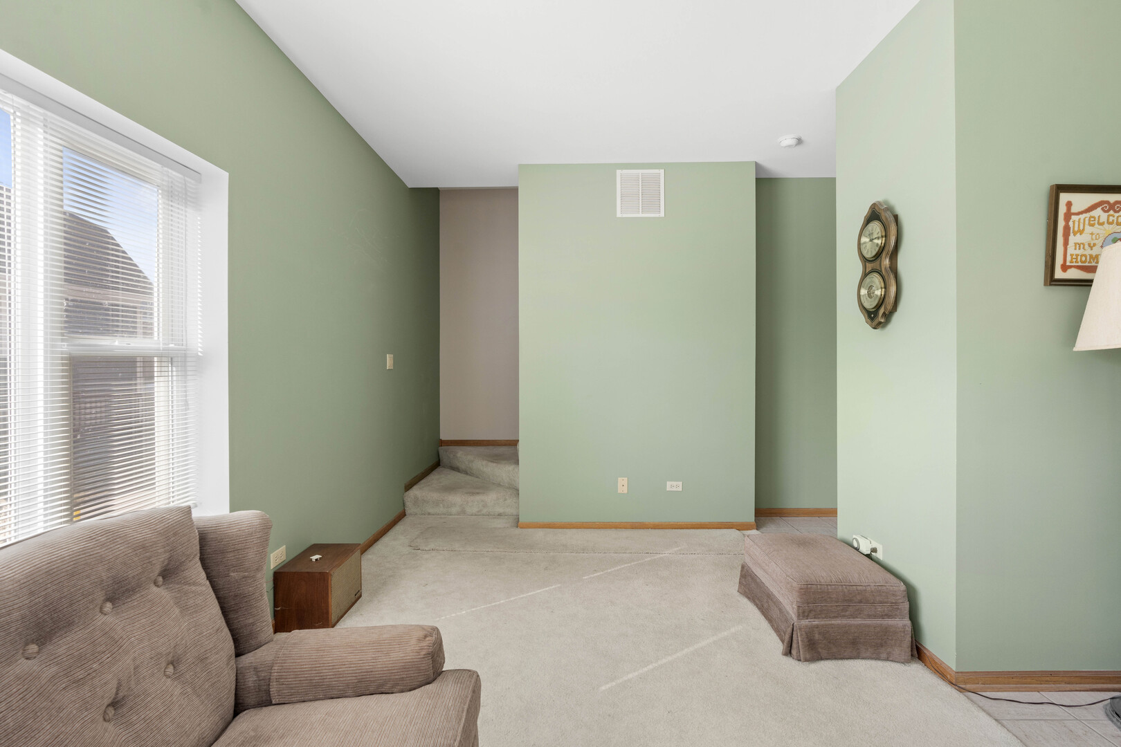 18134 Martin Avenue Homewood, IL 60430 - Photo 17 of 29 a living room with furniture and a window