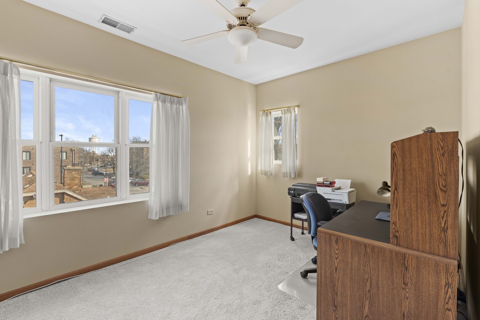 18134 Martin Avenue Homewood, IL 60430 - Photo 21 of 29 a workspace with furniture and window