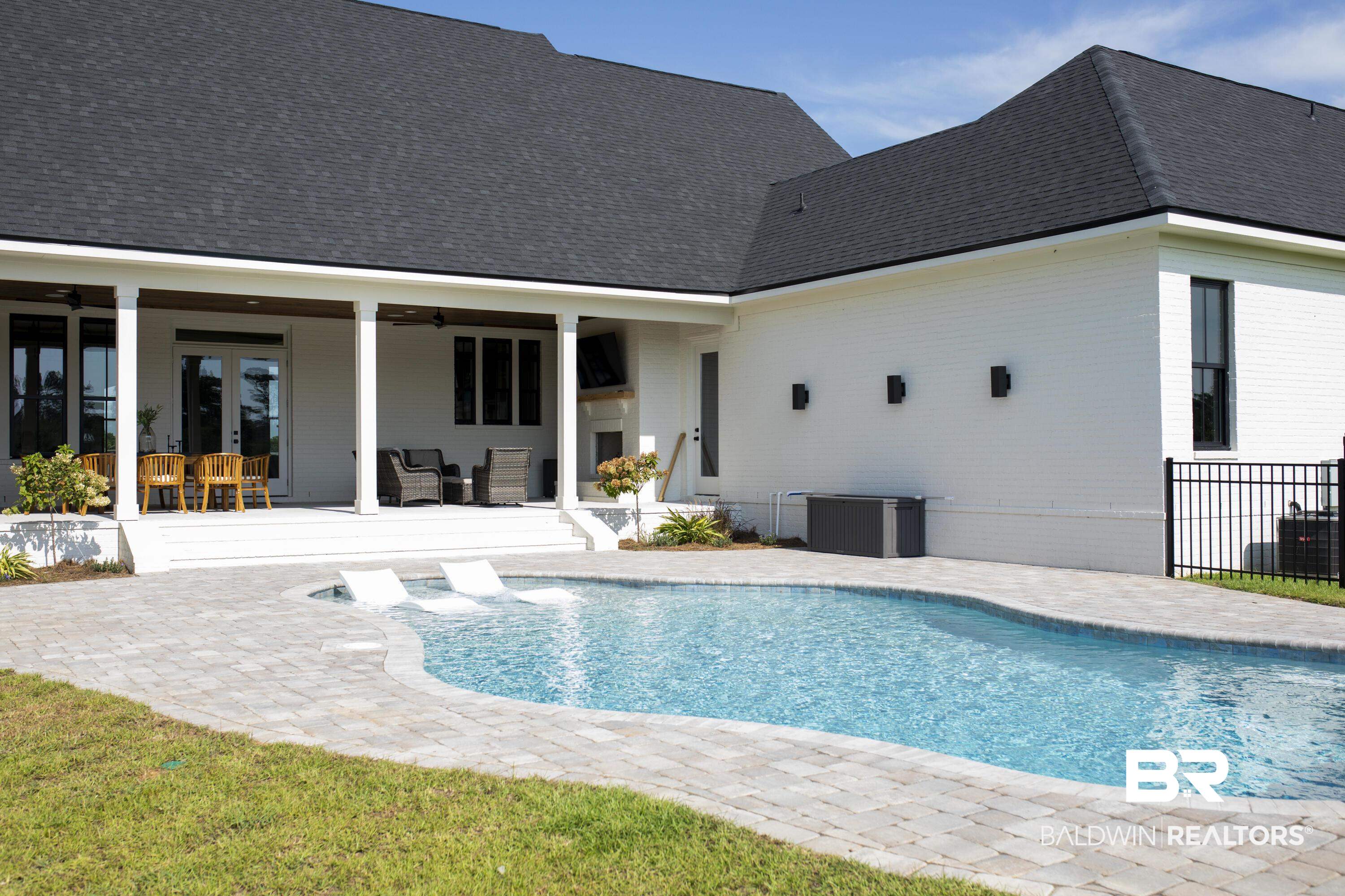21767 Gallery Boulevard Fairhope, AL 36532 - Photo 69 of 74 View of swimming pool featuring french doors, ceiling fan, outdoor lounge area, and a patio
