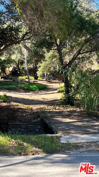 3485 Old Topanga Canyon Road Calabasas, CA 91302 - Photo 17 of 17 a view of a yard and street