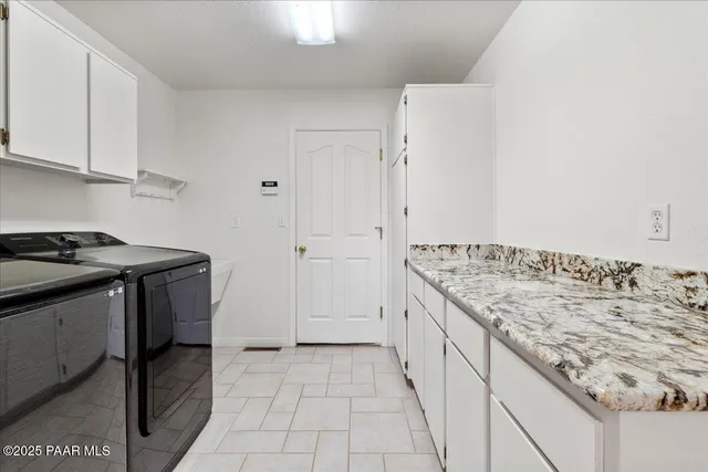 a kitchen with a stove and a sink