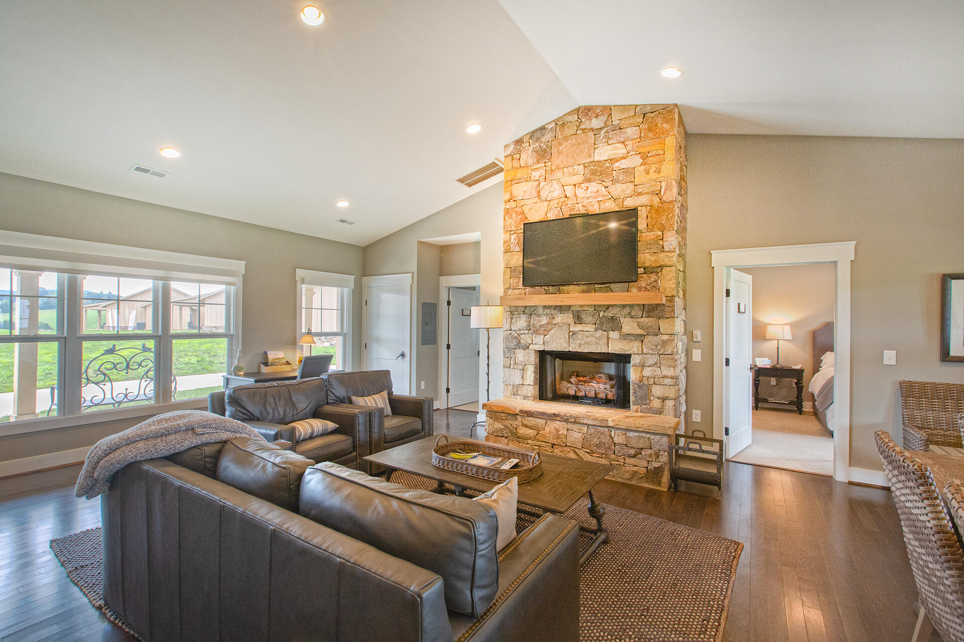 3864 Ballyhack Trail Roanoke, VA 24014 - Photo 19 of 61 a living room with furniture a flat screen tv and a fireplace