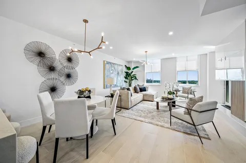 a bathroom with a shower and a glass door