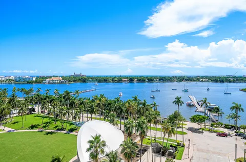 a view of a balcony with wooden floor