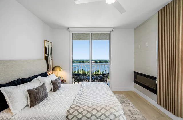 a bathroom with a double vanity sink mirror and toilet