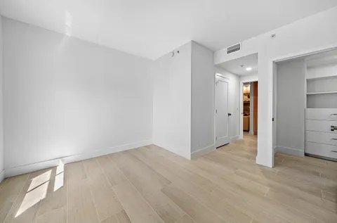 an aerial view of a house with a ocean view