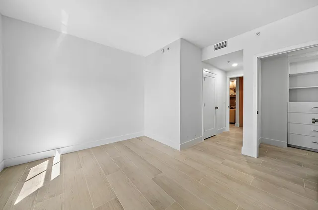 an aerial view of a house with a ocean view