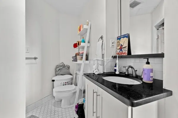a bathroom with a sink and a toilet