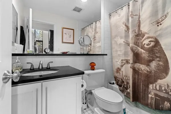 a bathroom with a sink and a toilet