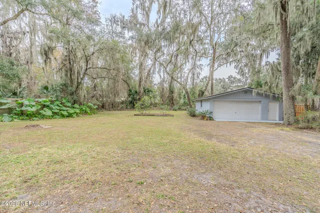 a view of outdoor space and yard