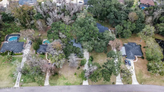 an aerial view of residential house with outdoor space