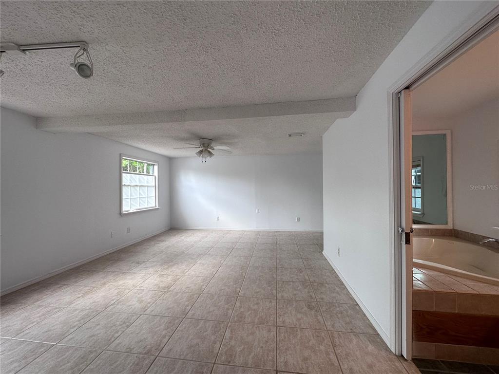 315 Sunburst Court Clearwater, FL 33755 - Photo 11 of 23 a view of an empty room and a window