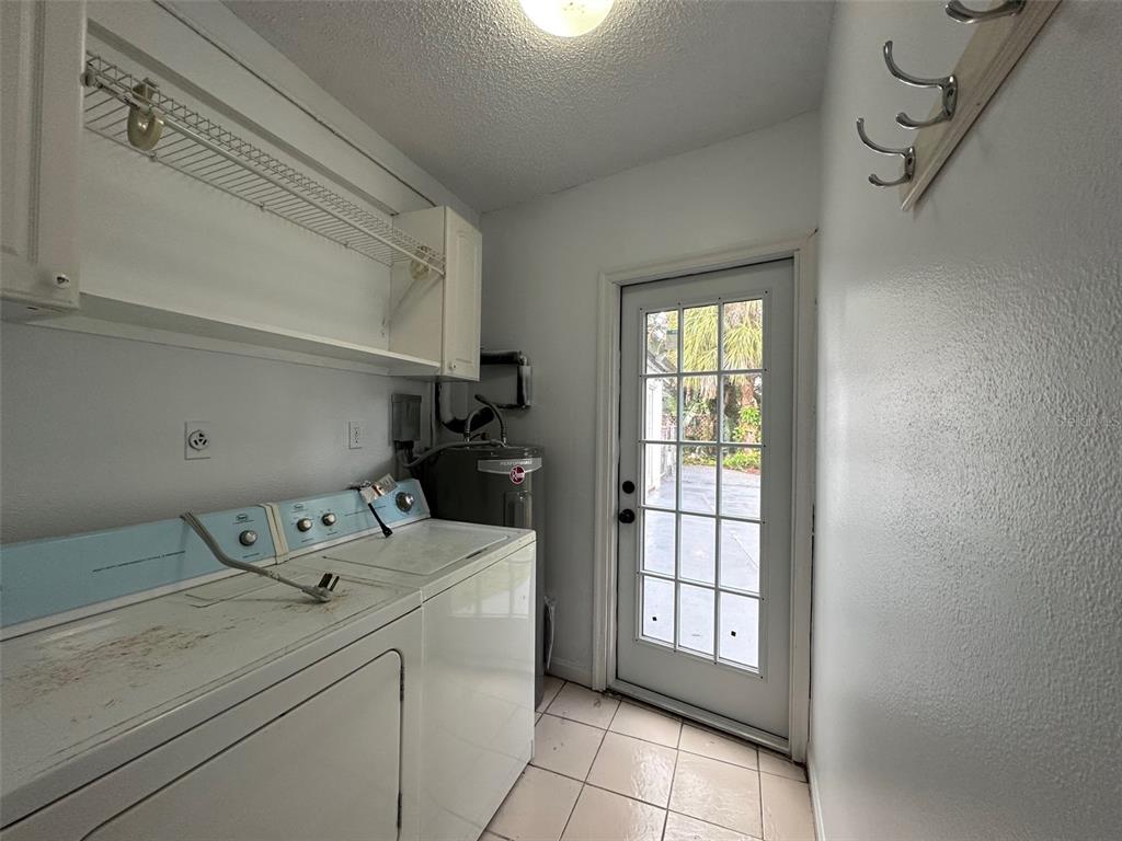 315 Sunburst Court Clearwater, FL 33755 - Photo 18 of 23 a utility room with dryer and washer