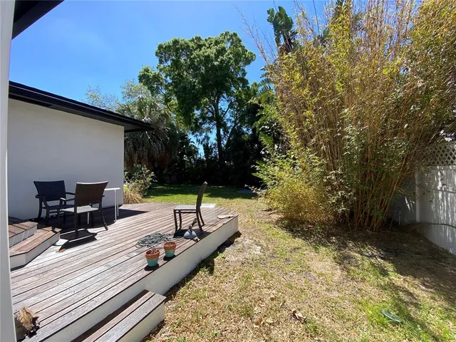 a view of a terrace with chairs
