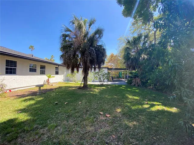 a view of a backyard with a garden