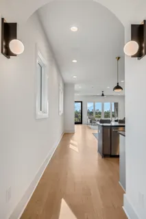 a view of living room and kitchen with furniture