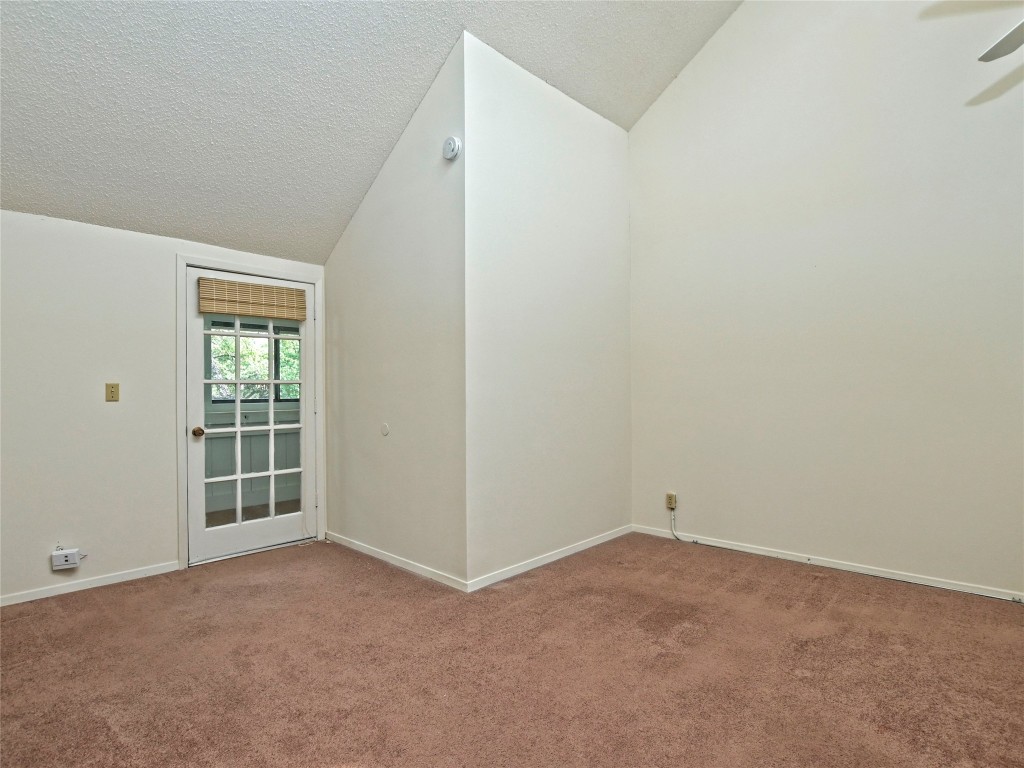 3 Casa Verde Street Lakeway, TX 78734 - Photo 14 of 30 an empty room with windows