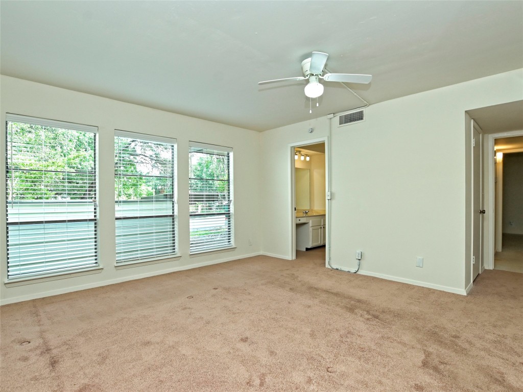 3 Casa Verde Street Lakeway, TX 78734 - Photo 17 of 30 a view of an empty room with a window