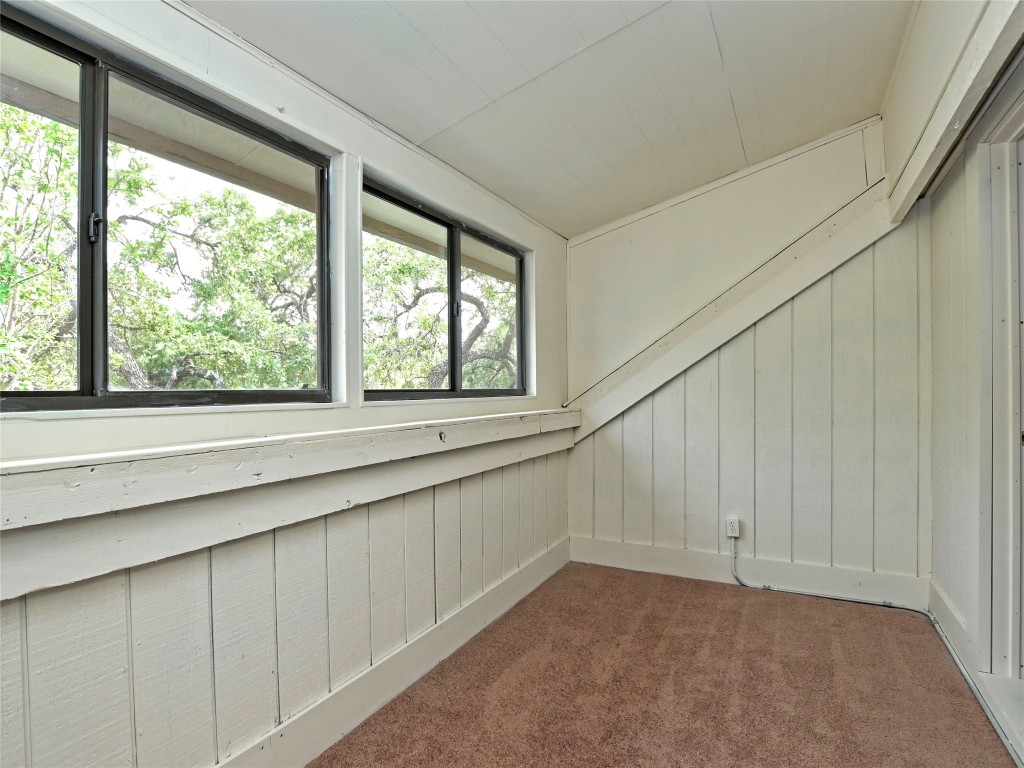 3 Casa Verde Street Lakeway, TX 78734 - Photo 18 of 30 a view of an empty room with a window